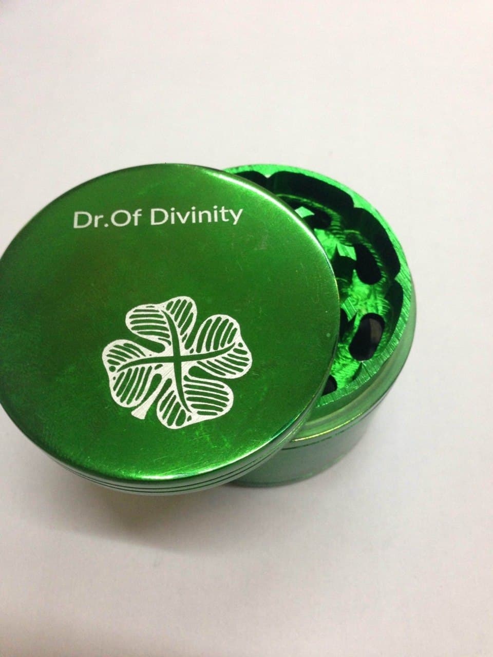 Custom grinder engraved with a four-leaf clover