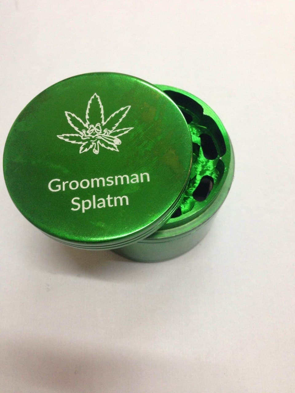Groomsman Splatm grinder with cartoon leaf
