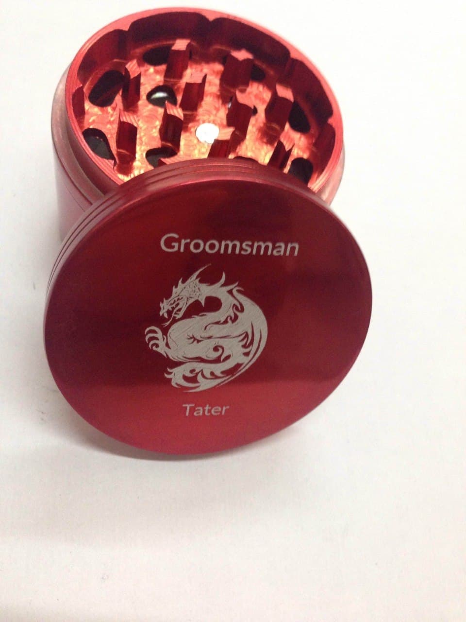 Custom groomsman grinder engraved with a dragon design