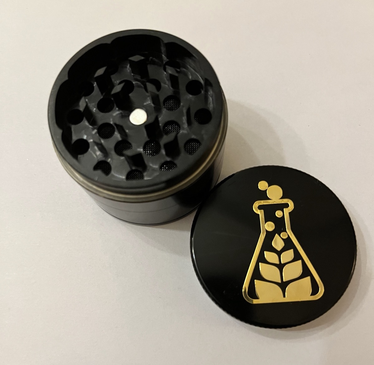 Sanctuary Medicinals custom grinder, gold engraving